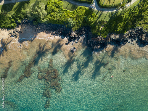 Landscape, horizontal orientation picture from a drone over the waters and beaches on the island of Maui, Wailea, Hawaii. photo