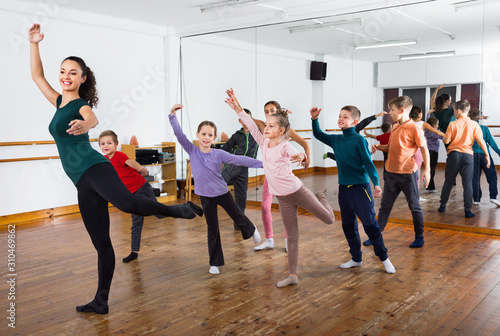 Children dancing contemp in studio smiling and having fun