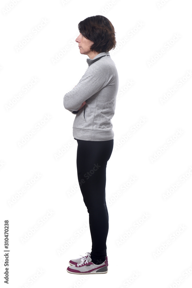 side view of a woman in white background, arms crossed side view of a woman in white background, arms crossed