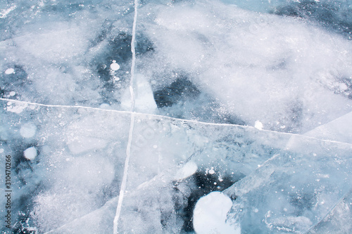Ice texture on surface of frozen lake, nature background image