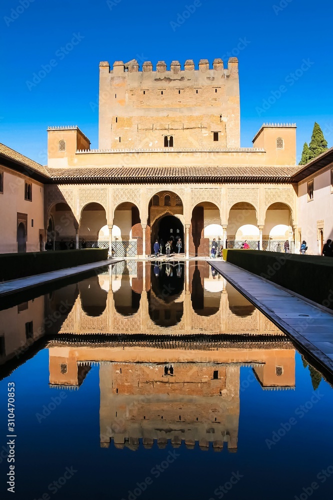 Fototapeta premium Reflections on the Myrtles Court Pool South Portico in the Alhambra Granada Spain