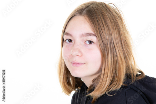 Beautiful young girl portrait tennage smiling looking to camera isolated on white background