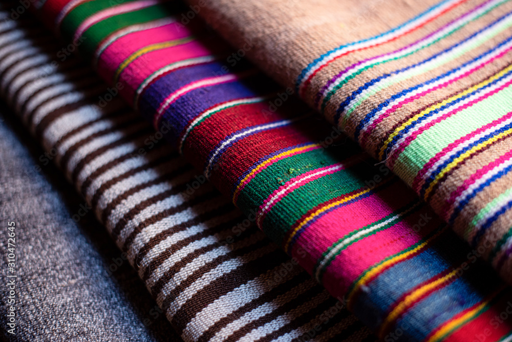 Close up of traditional Peruvian woven fabrics Close up of traditional Peruvian woven fabrics