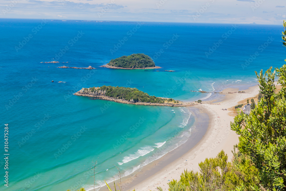 View on Touranga city and Papamoa Beach from Mount Maunganui on northern island of New Zealand in summer