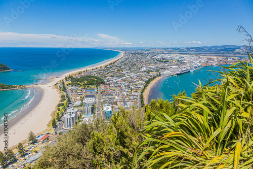 View on Touranga city and Papamoa Beach from Mount Maunganui on northern island of New Zealand in summer photo