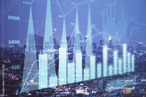 Financial graph on night city scape with tall buildings background double exposure. Analysis concept.