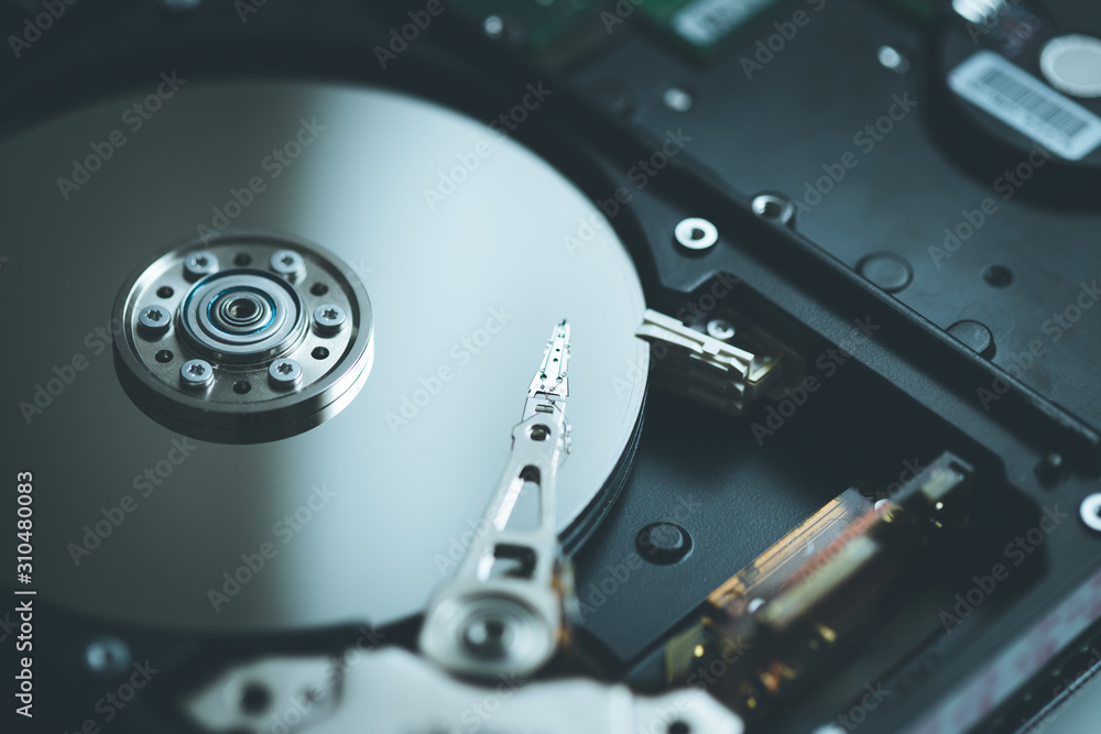 Storage, backup and cloud concept: Close up of hard disk drive Storage, backup and cloud concept: Close up of hard disk drive