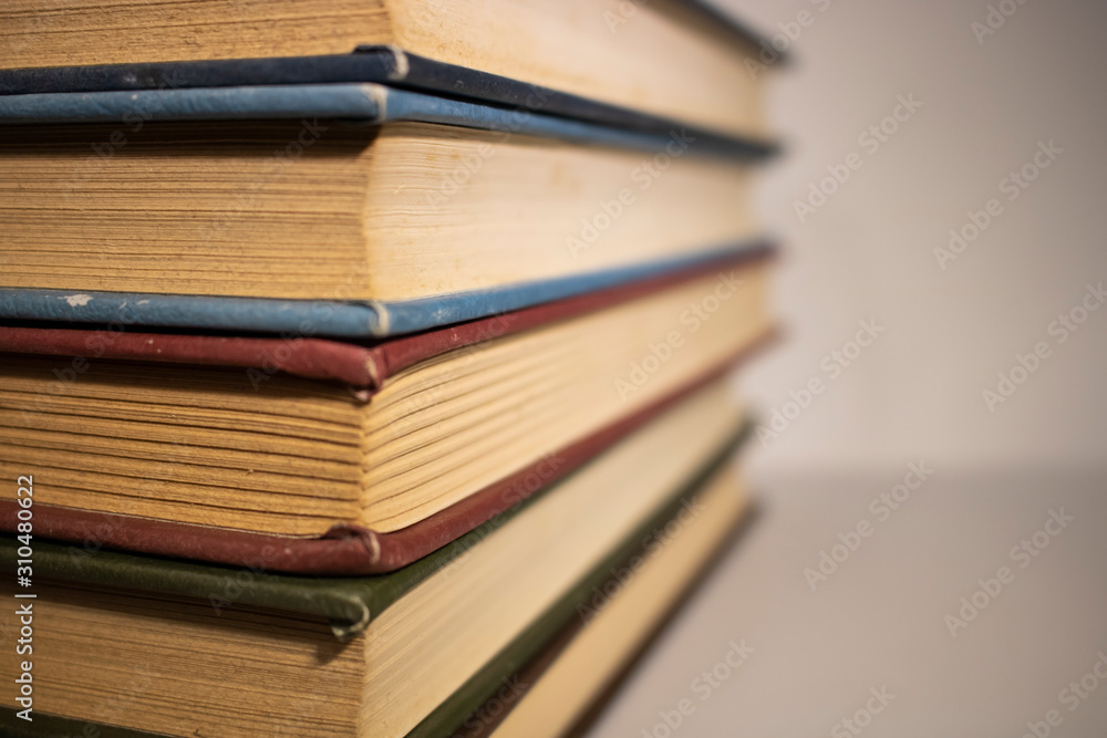 stack of books on white background close up stack of books on white background close up