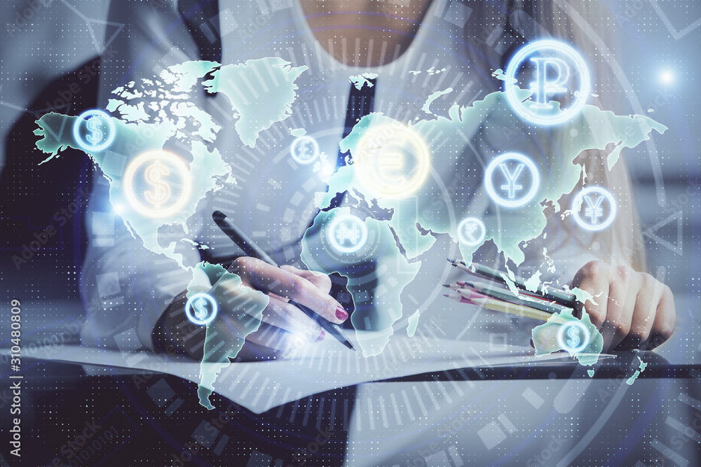 Double exposure of hands making notes with forex chart huds. Stock market concept. Double exposure of hands making notes with forex chart huds. Stock market concept.