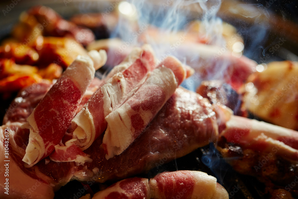 Korean BBQ, meat on iron plate Korean BBQ, meat on iron plate
