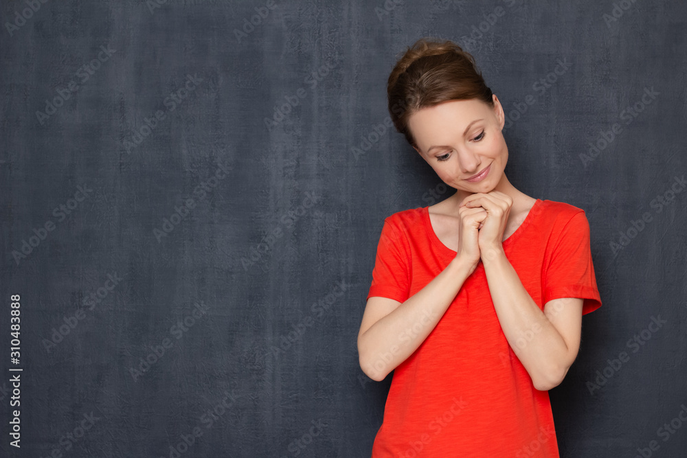 Portrait of dreamy young woman smiling and being deep in thoughts Portrait of dreamy young woman smiling and being deep in thoughts
