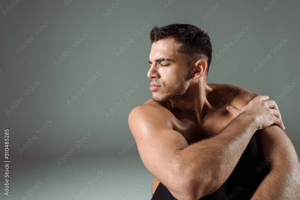 handsome dancer with closed eyes dancing contemporary on grey background handsome dancer with closed eyes dancing contemporary on grey background