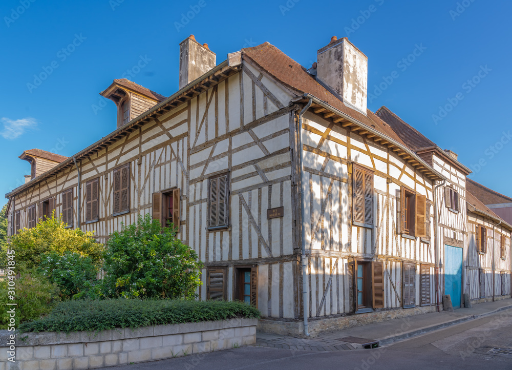 Troyes, France - 09 08 2019: Typical street with half-timbered facades