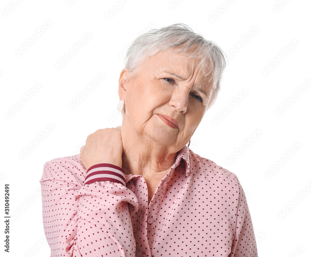 Senior woman suffering from neck pain on white background Senior woman suffering from neck pain on white background