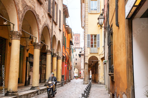 One of the old streets of the historic center of Bologna, Italy.