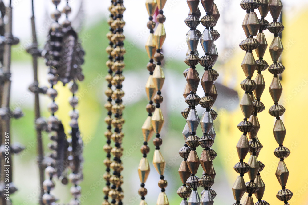 Selective Focus on Junk Metals Jewelery Bead Garlands Necklace Selective Focus on Junk Metals Jewelery Bead Garlands Necklace
