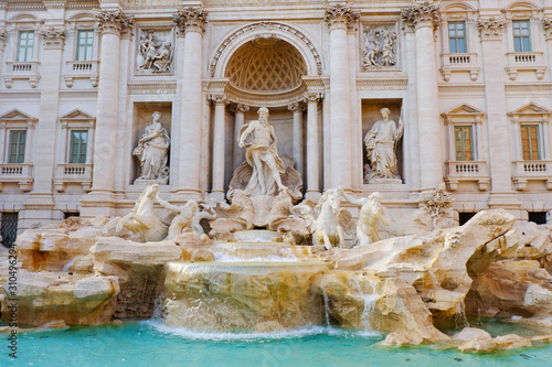 Trevi Fountain in Rome, beautiful rococo fountain with sculpted figures. Fontana di Trevi in Roma, Italy, Europe. Famous travel destination. Italian roman architecture and landmark in eternal city.
