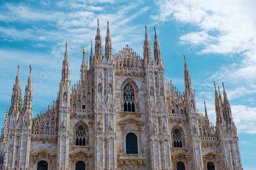 Wallpaper Mural Cathedral Duomo di Milano on Square Piazza Duomo at sunny day, Milan, Italy, Europe. Famous and popular Italian touristic destination, Basilica, church of Milan city. Italian summer vacation. Torontodigital.ca