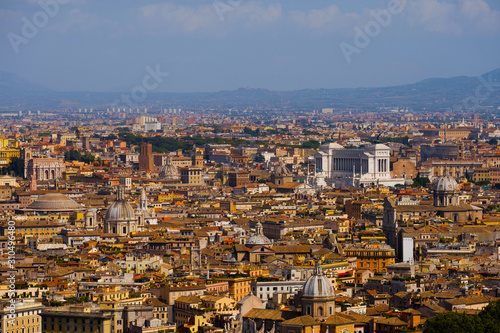 Vatican City view from the top of St. Peter's Basilica in Rome Italy. Looking down over Piazza San Pietro in Vatican. Aerial cityscape view of Roma buildings and landmarks. Famous travel destination. © YOUproduction