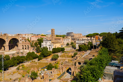 Ruins of the Roman Forum at Palatino hill in Roma, Italy, Europe. Famous travel destination. Italian ancient roman architecture aerial view. Landmarks in eternal city. Summer holidays.