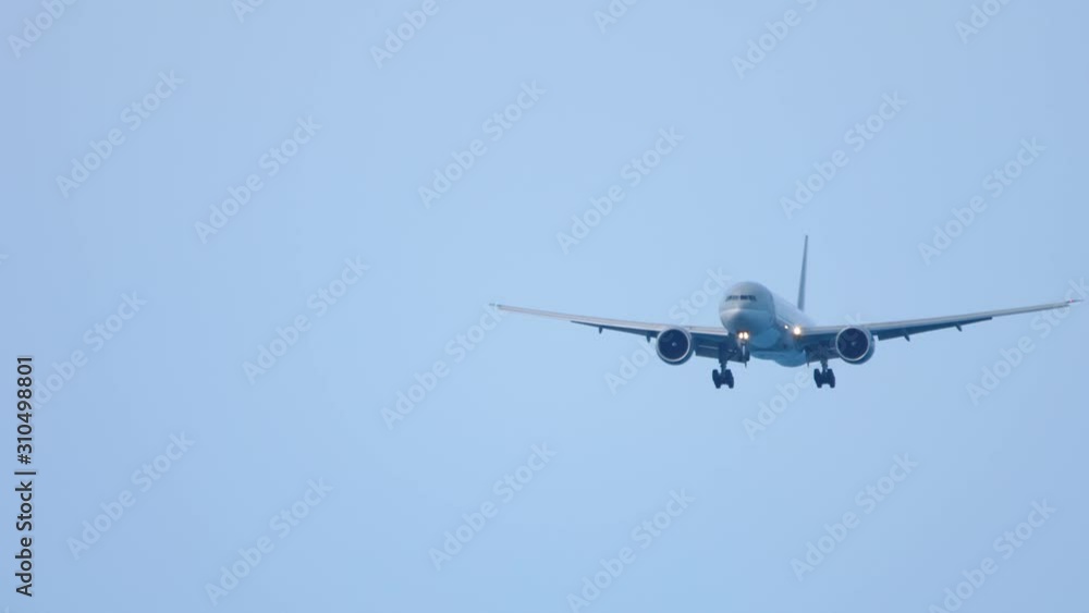 Widebody airplane approaching before landing Widebody airplane approaching before landing
