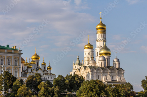 2019.09.07, Moscow, Russia. Kremlin architectural ensemble at sunny day. Golden domes of churches sparkle in the sun.