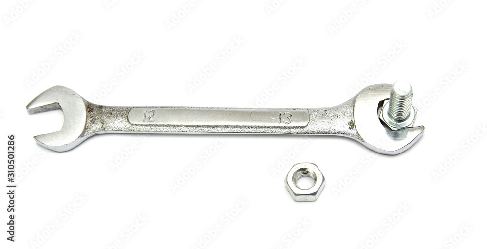 Wrench and bolt isolated on a white background. Wrench and bolt isolated on a white background.