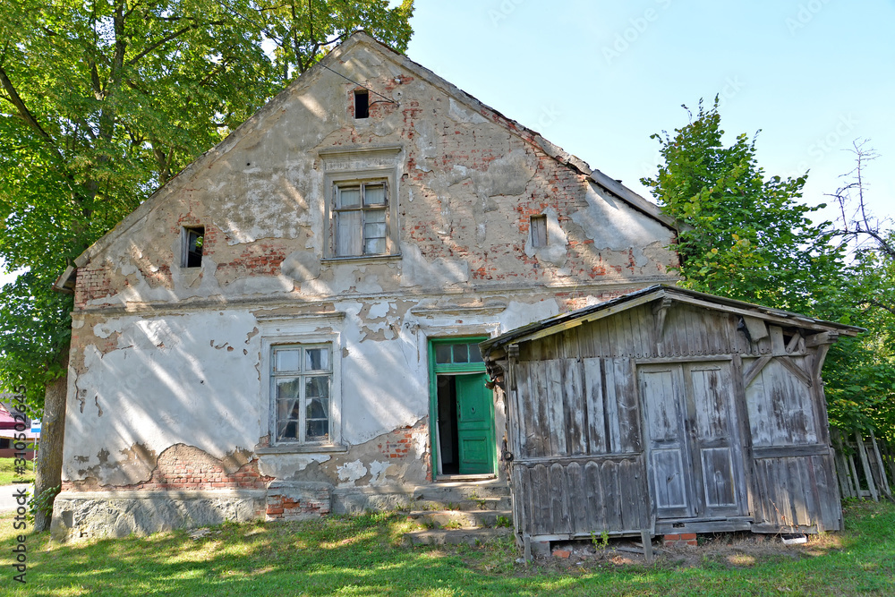 Dilapidated house of German construction. Novostroevo village, Kaliningrad region. Dilapidated house of German construction. Novostroevo village, Kaliningrad region.