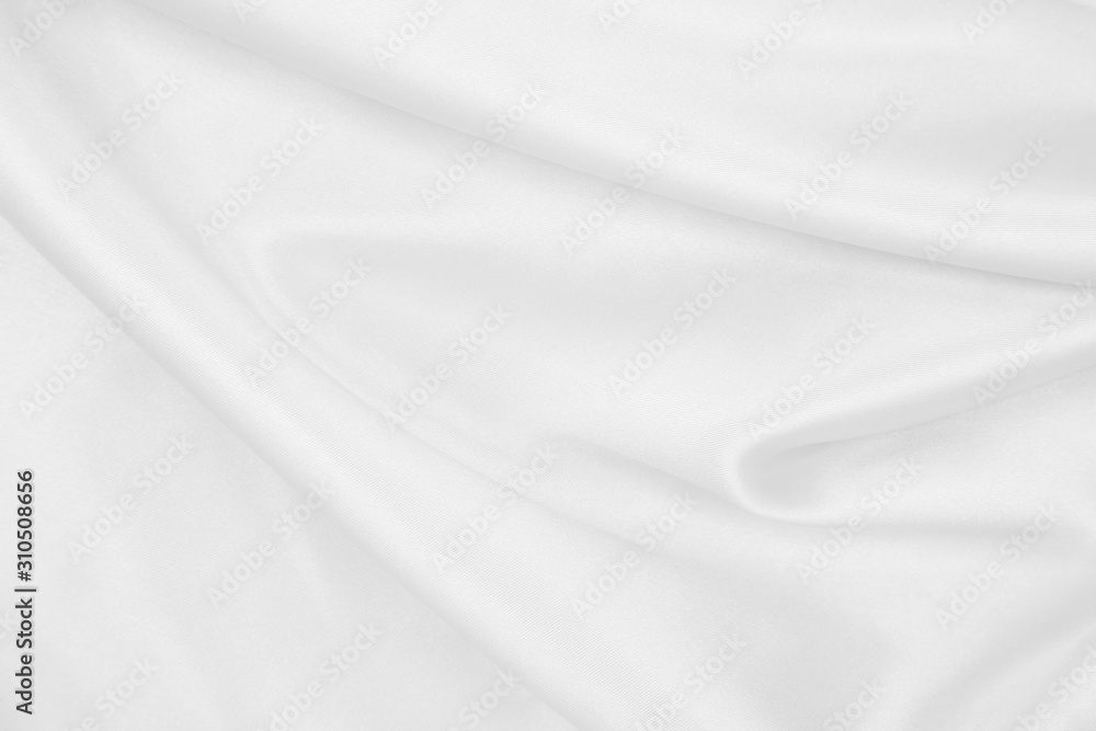 Smooth elegant white silk or satin luxury cloth texture as wedding background. Luxurious background design Smooth elegant white silk or satin luxury cloth texture as wedding background. Luxurious background design