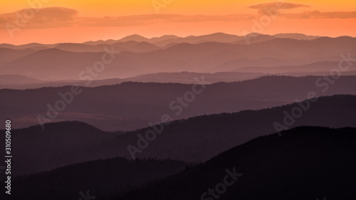 Fototapeta Naklejka Na Ścianę i Meble -  Splendid mountain sunrise. Mountains silhouettes on a beauty background. Bieszczady Mountains Poland.