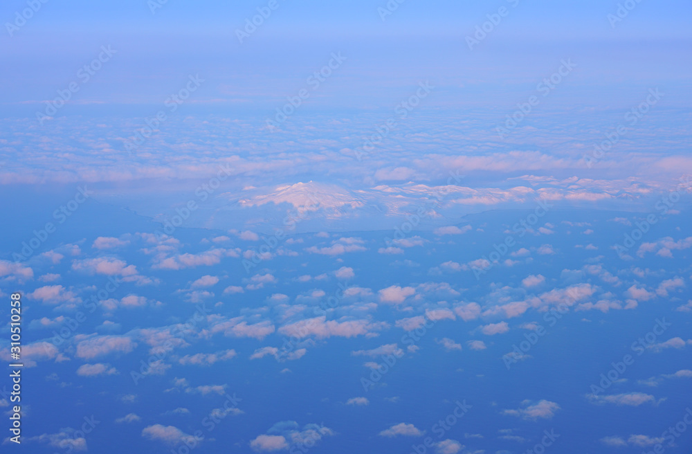 Aerial view of the Snaefellsnes peninsula and Snaefellsjökull volcano covered with ice and snow in Iceland Aerial view of the Snaefellsnes peninsula and Snaefellsjökull volcano covered with ice and snow in Iceland