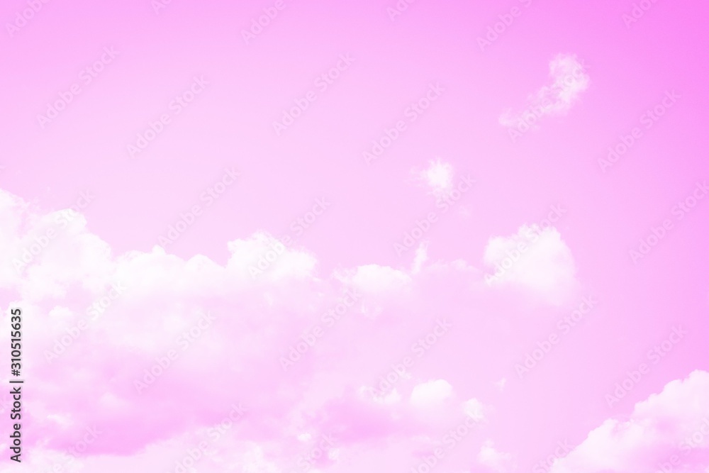 Light soft pink sky background. Beautiful romantic sky with white clouds Light soft pink sky background. Beautiful romantic sky with white clouds