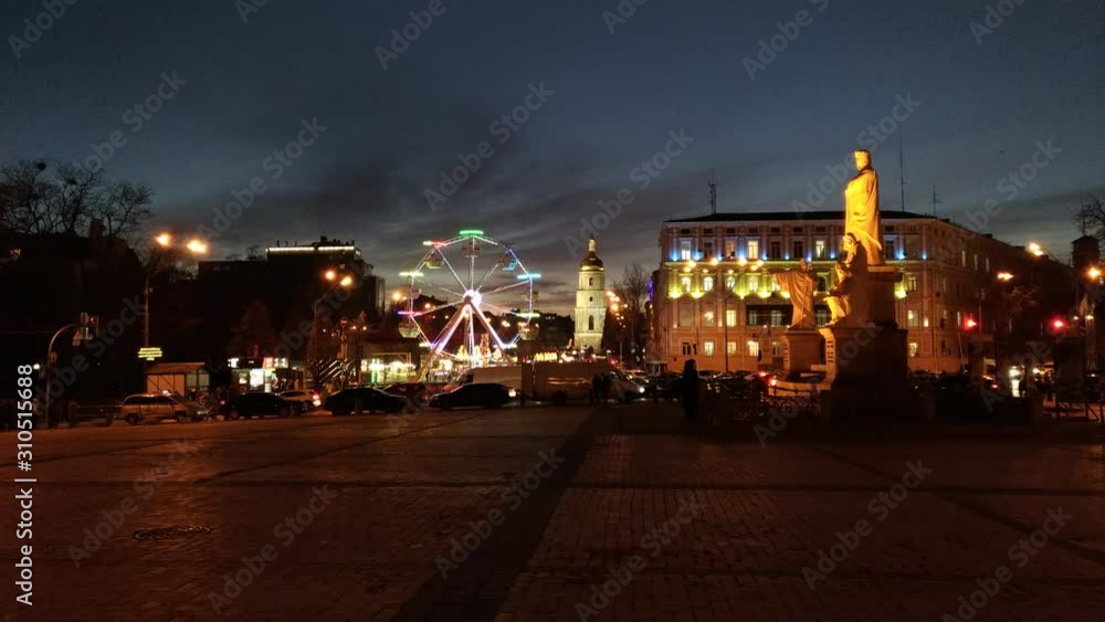 ferris wheel at night, panorama of Sophia Square with the Christmas entertainment area, the Ferris wheel, St. Sophia Cathedral, New Year's lights are visible, the city is festively decorated ferris wheel at night, panorama of Sophia Square with the Christmas entertainment area, the Ferris wheel, St. Sophia Cathedral, New Year's lights are visible, the city is festively decorated