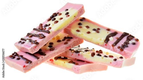 Pink chocolate with strawberries and popped rice isolated