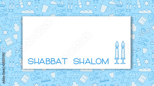 Shabbat blue background with copy space. Star of David, candles, kiddush cup and challah. Hebrew text 