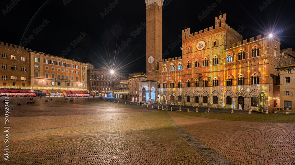Siena and its famous Piazza del Campo during Christmas time. Tuscany, Italy.
