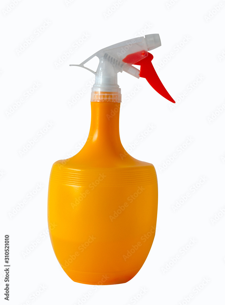 Orange spray liquid for flowers close-up. Isolated object on white background. Orange spray liquid for flowers close-up. Isolated object on white background.