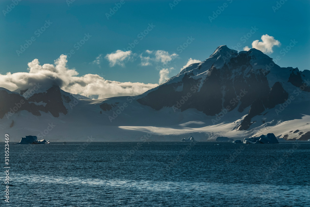 Antantic mountains and the Antarctic Sea, near the Antarctic Peninsula.