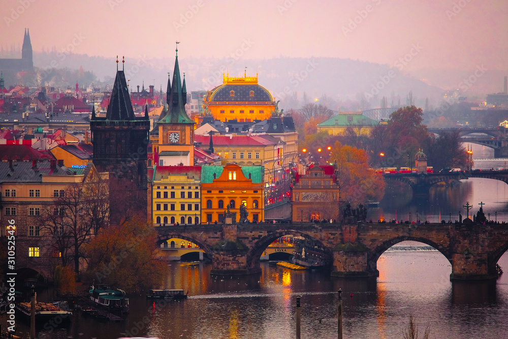 Prague, Czech Republic - November, 22, 2019: Prague landscape with view of Charles bridge - obrazy, fototapety, plakaty 