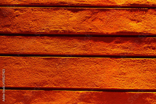Wallpaper Mural Orange lit stone wall background Torontodigital.ca