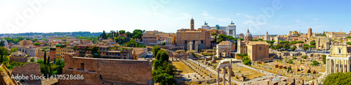 Ruins of the Roman Forum panorama at Palatino hill in Roma, Italy, Europe. Famous travel destination. Italian ancient roman architecture aerial view. Landmarks in eternal city. Summer holidays.