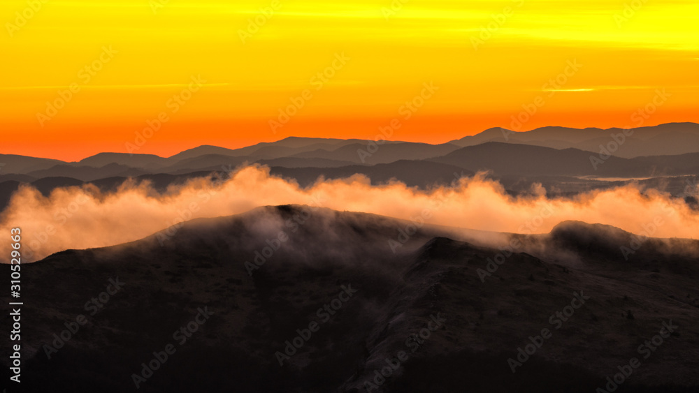 Awesone sunrise in the mountains. Bieszczady, the part of Carpathian Mountains. Poland.