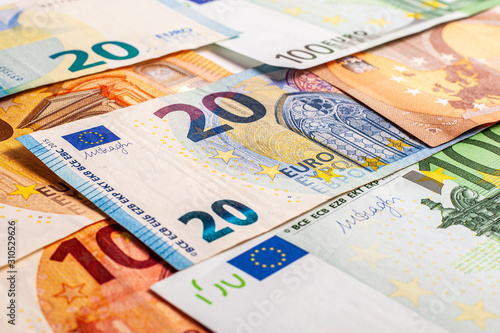 Euro money – Euro cash background. Background from several euro paper cash. Banknote texture. Financial concept of money. © Andrii A
