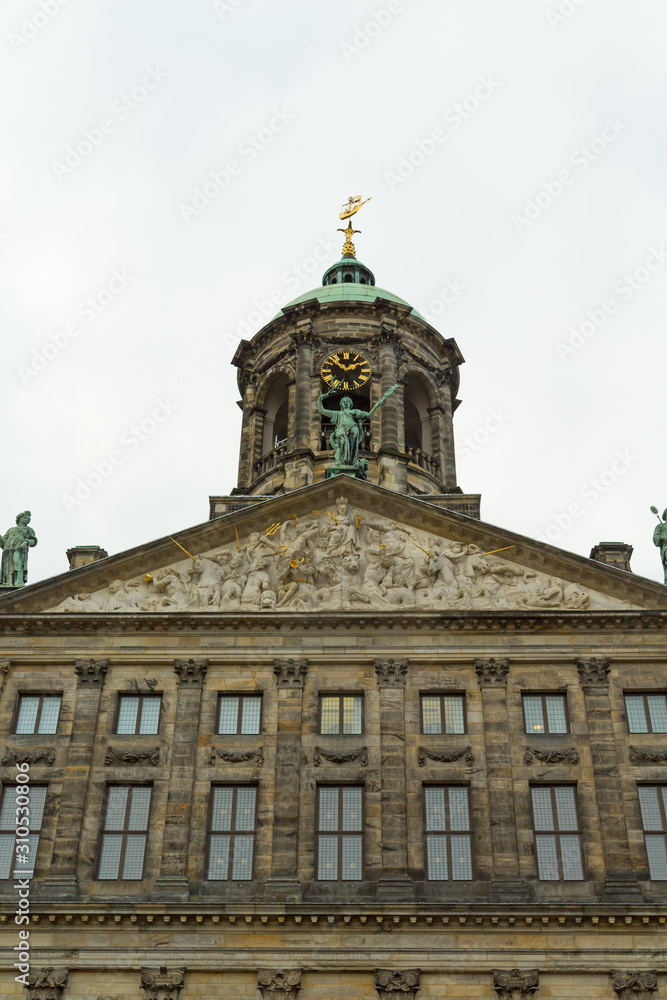 Top part of The Royal Palace in Dam Square, Amsterdam, Netherlands. Vertical