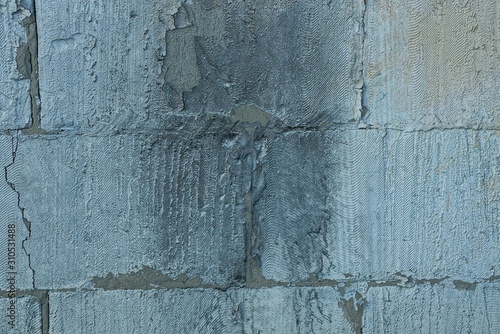 stone texture of gray brick wall in black soot
