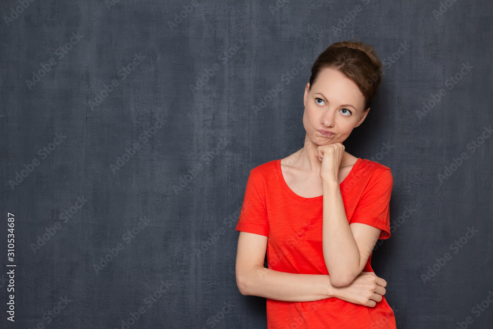 Portrait of dissatisfied woman being focused on unpleasant thoughts Portrait of dissatisfied woman being focused on unpleasant thoughts