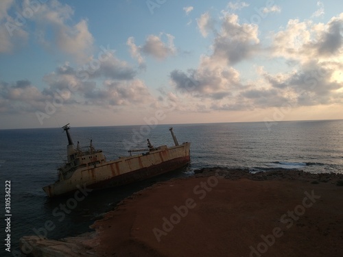Edro III - Ship after a shipwreck  coast with cliffs at sunset  Cyprus  Mediterranean Sea