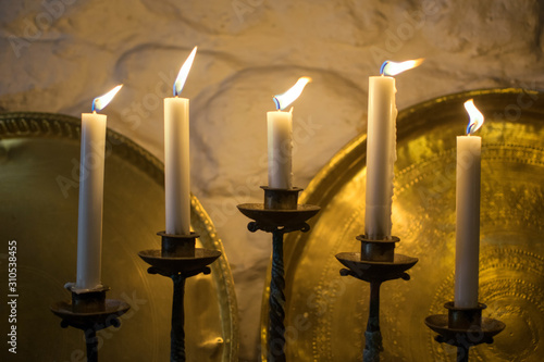 Fototapeta Golden candelabrum or candle chandelier with light candles