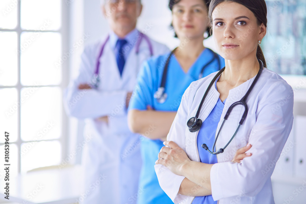Group of doctors and nurses standing in the hospital Accident and Emergency department Group of doctors and nurses standing in the hospital Accident and Emergency department