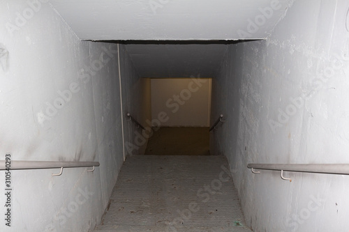 Industrial concrete staircase  white plaster